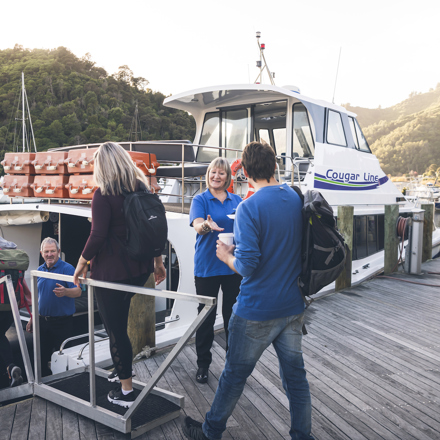 Passengers board their Cougar Line boat in Picton Marina.