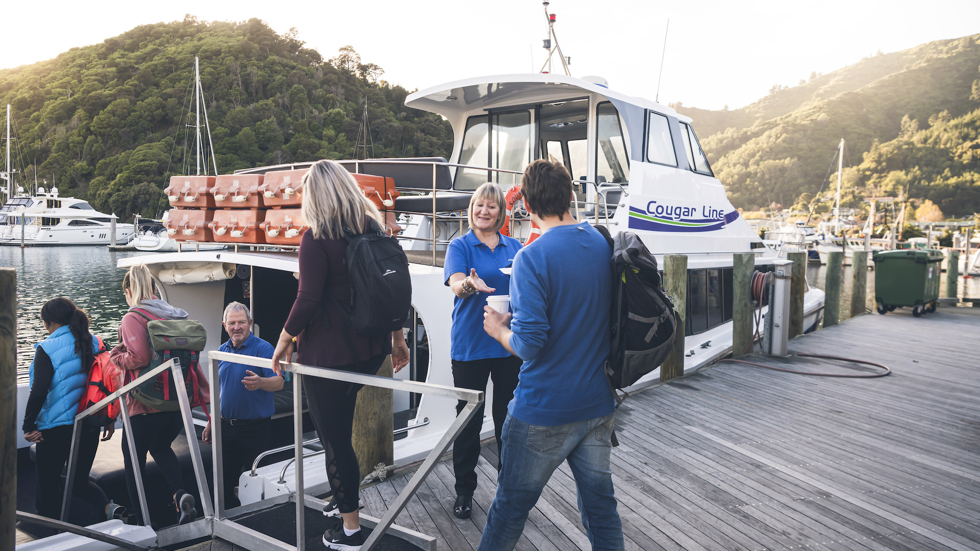 Passengers board their Cougar Line boat in Picton Marina.